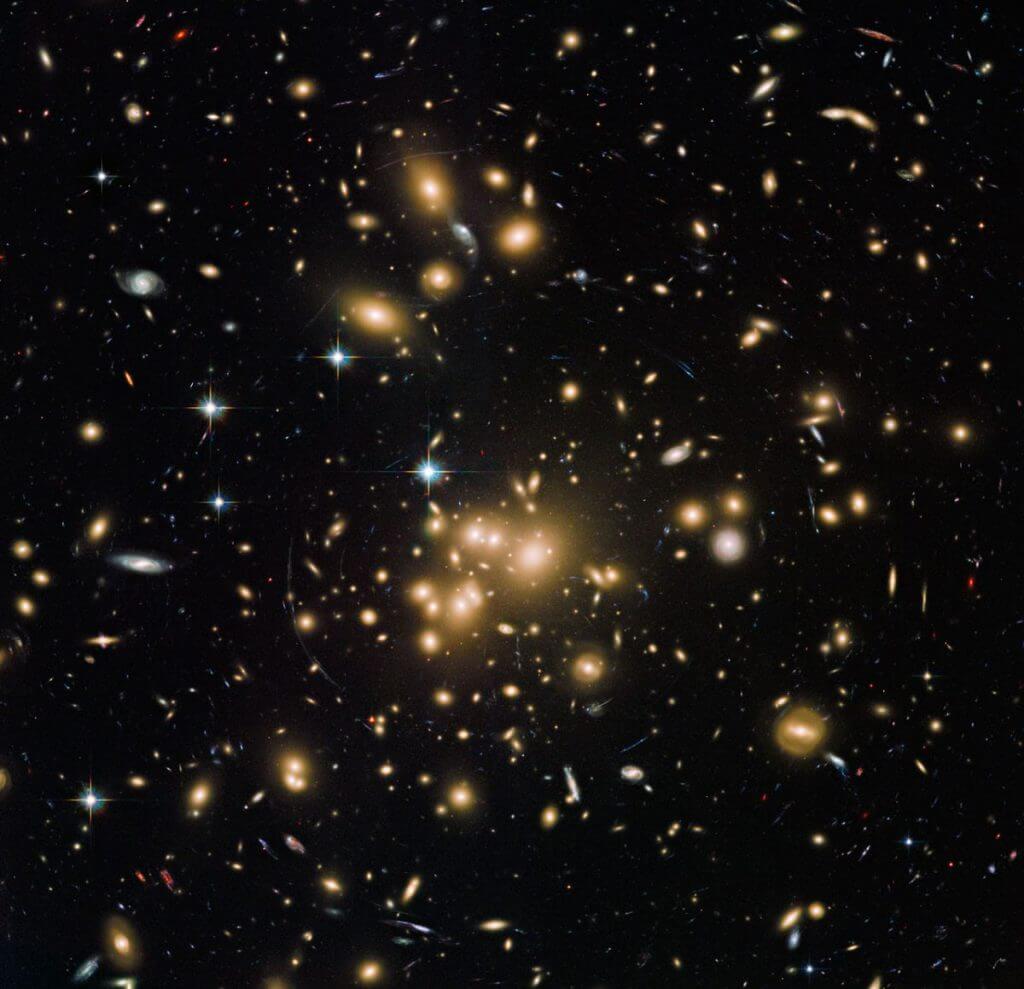 What’s it like inside a massive galaxy cluster? Scientists used 196 lasers to find out._622f3f4a861d8.jpeg