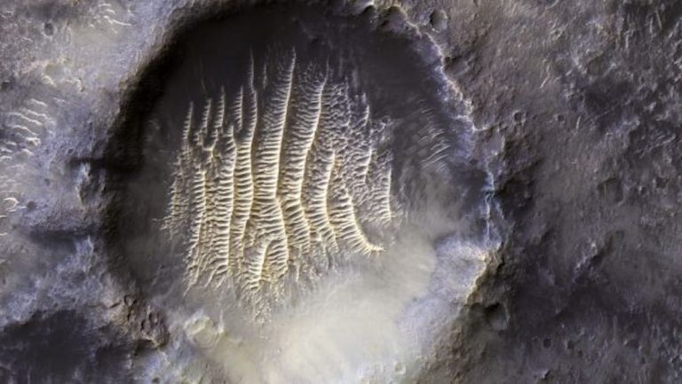 Martian crater looks just like a human fingerprint in this incredible new image_6267ed87ba5f9.jpeg