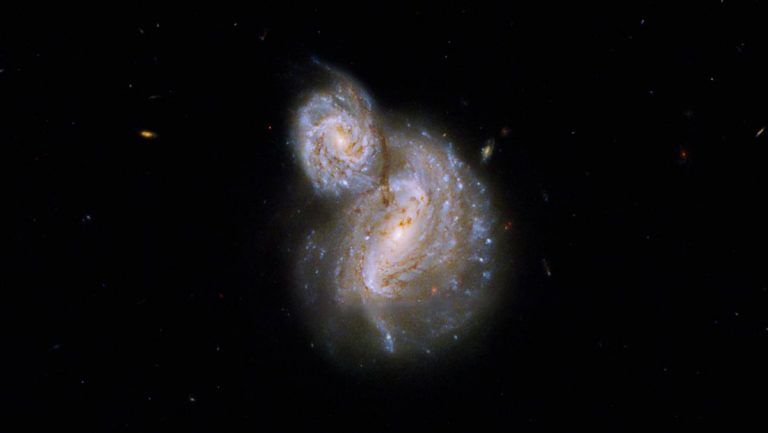 Hubble telescope snaps trippy new view of two swirling galaxies_6296142107cae.jpeg