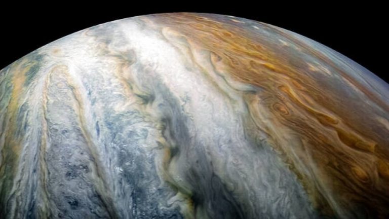 NASA spacecraft zooms over Jupiter’s swirling clouds at 131,000 mph_629b5b973aca3.jpeg