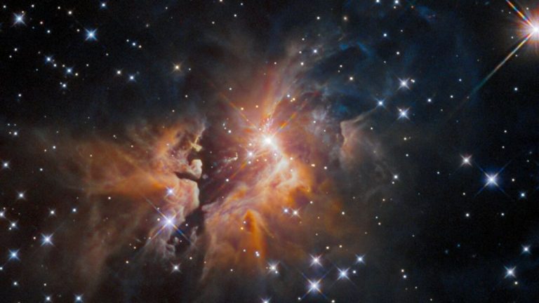 Hubble Space Telescope shows ‘fan-like spray’ of gas and dust surrounding young star_63456985ac097.jpeg