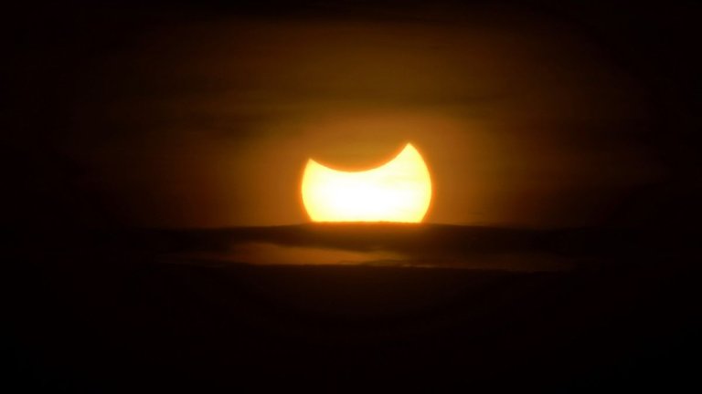 The moon blocks the sun in a rare hybrid solar eclipse today_643ff09a63eb9.jpeg