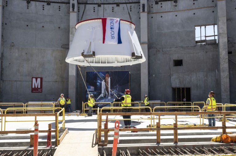 ‘Go for Stack’: 1st parts of space shuttle Endeavour vertical display lifted into place at California Science Center_64bbe082ca185.jpeg