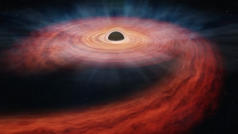 Supermassive black hole chews up huge star, spits stellar ‘guts’ into space (video)_64e60efa439ed.jpeg