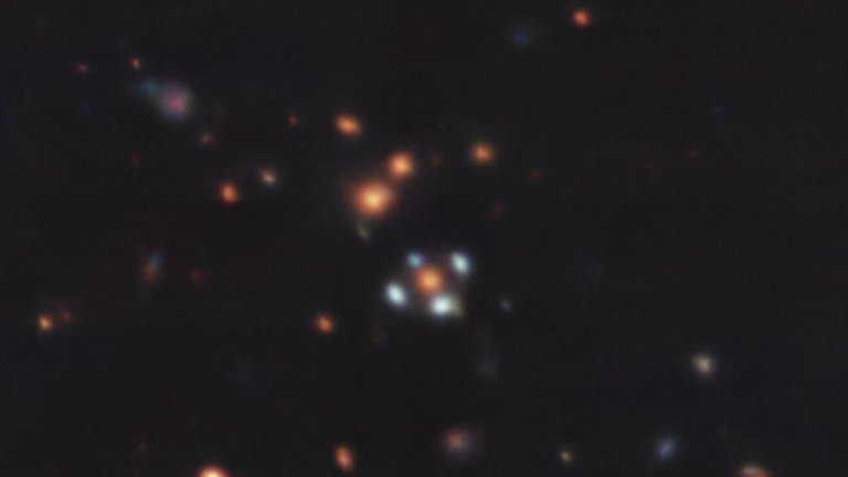 Einstein cross! Gravitationally lensed ‘flower’ spotted in deep space (photo)_650310ca47cfa.jpeg