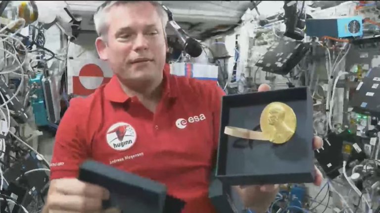 Astronaut shows off vintage Nobel Prize in space — and talks ‘quantum dots’ ISS experiment (video)_6577fb5d41db2.jpeg