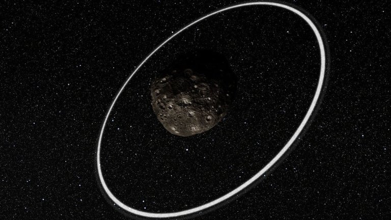 Tiny, unseen moon could be holding bizarre space rock Chariklo’s rings in place_65c4eabc3682a.jpeg