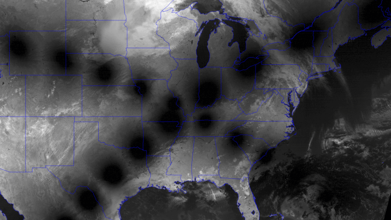 Satellite images overlay 2024 and 2017 total solar eclipses sweeping across US_662bb237c411c.png