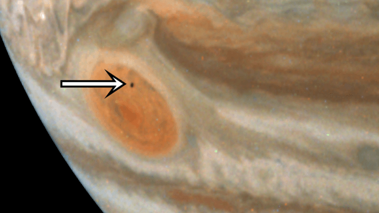 Mysterious Moon Photobombs Jupiter’s Great Red Spot in Latest Juno Image_66439b44b57a2.png