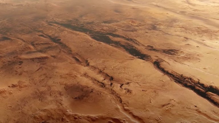 Fly over the scarred canyons of Mars in this breathtaking video from European spacecraft_6661bfae097bd.jpeg