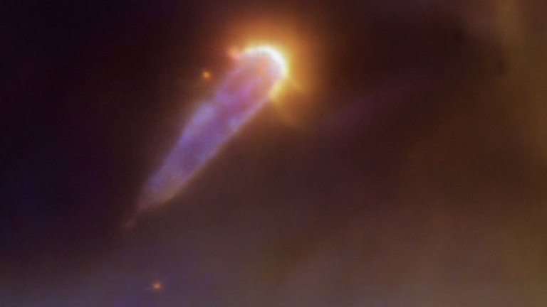 This planet-forming disk shaped like a comet is struggling to survive_665f8d41a50f4.jpeg