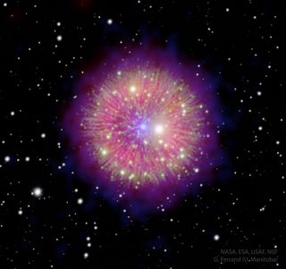 a small, bright blue central dot erupts with rays of brilliant pink and yellow-green, with shining stars dispersed within as well as around in the black of space.