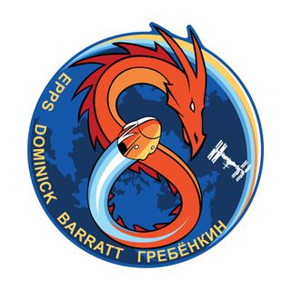 a circular space mission patch, showing an orange dragon and a yellow-orange space capsule