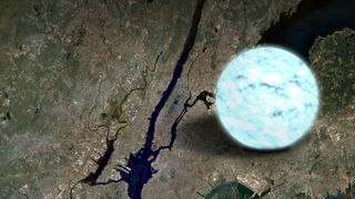 A bright blue glowing sphere over a map of Manhattan.