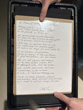 A piece of paper with the poem.