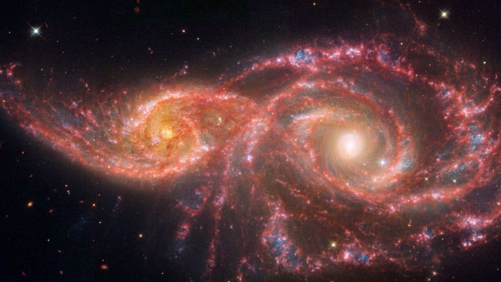 Stare into the ‘blood-soaked eyes’ of 2 spooky galaxies in new Hubble, JWST images (video)_6723df6509c66.jpeg