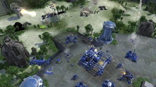 An isometric view of a strategy game, showing the blue team's base and several mech units from their army in a forest environment.