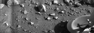 The first image captured by NASA's Viking 1 lander on Mars, on July 20, 1976, shows one of the spacecraft's footpads.