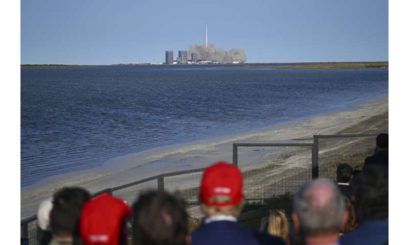 SpaceX launches giant Starship rocket, but aborts attempt to catch booster with mechanical arms