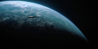 A starship hovers over a cloudy blue planet