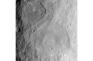 A grey pitted landscape