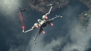 An x-wing spaceship chasing down a TIE fighter over a large body of water, firing red laser shots at it.