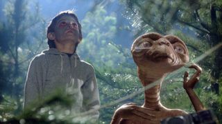 E.T. and Elliot in the woods in E.T. the Extra-Terrestrial