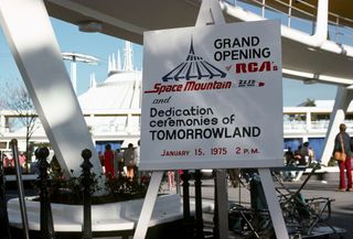 A sign advertises the grand opening ceremony for Space Mountain at Walt Disney World on Jan. 15, 1975.